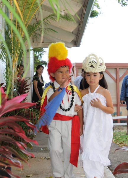 Michael says ~ Aloha Kim, & everyone at SmileyMe, It's Michael again! I just wanted to say a big great thank you once again for the amazing feathers you delivered and i just wanted to send a picture to show you what it was used for, again thank you.  It was used to make a hawaiian kings helmet for my school's may day program, that my school and the parents of the king faught over to keep! Looks like I'll be ordering more feathers to make more helmets hahaha.